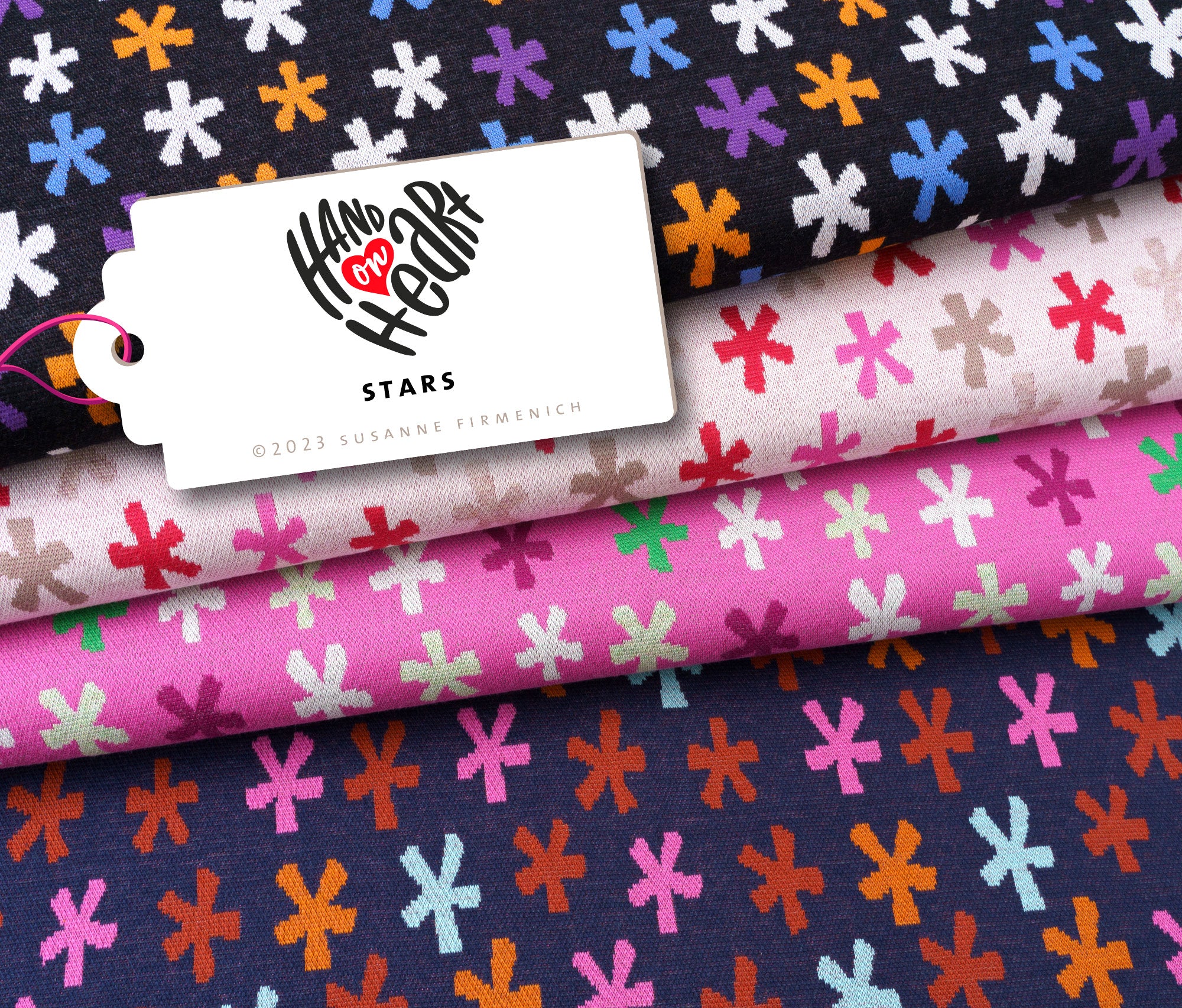 albstoffe-hand-on-heart-stars-jacquard-jersey-bio-meterware image 1